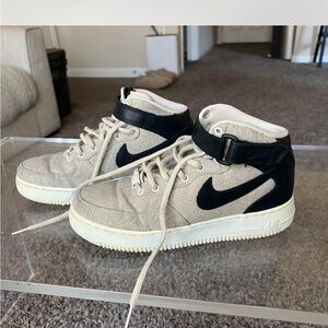 Nike Air Force 1 High-Tops in Beige and Black